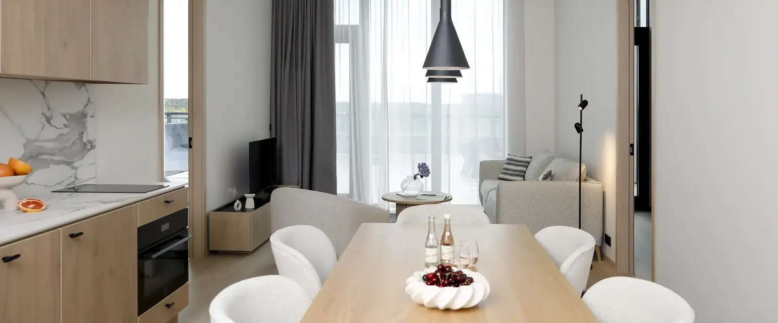 a room with a table and chairs