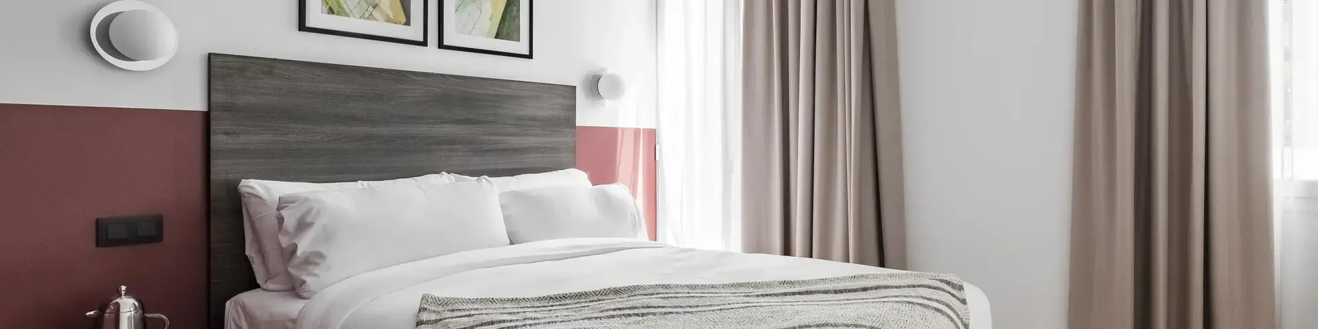 a bed with a blanket in a room