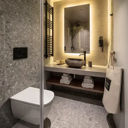 a bathroom with a sink and a mirror