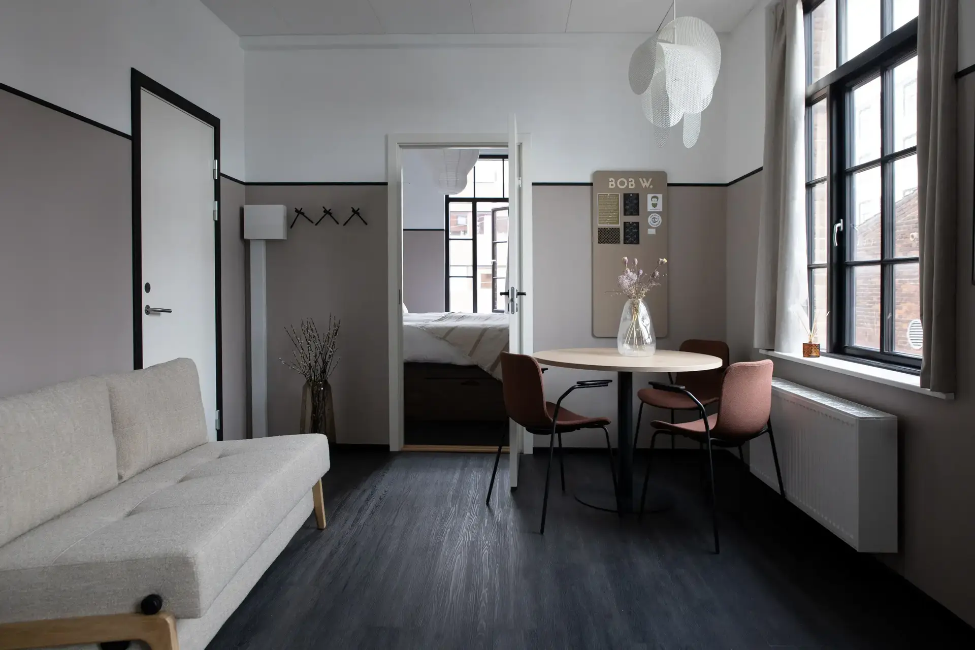 a room with a table and chairs