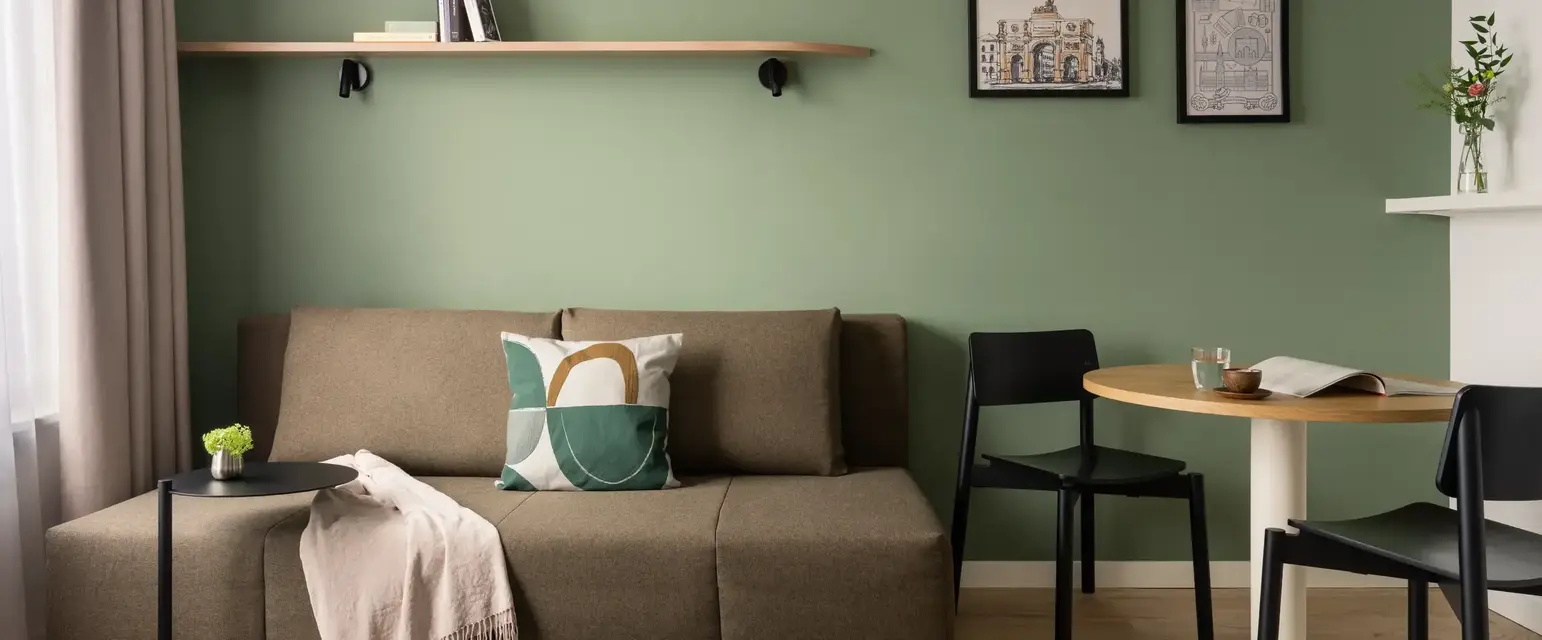 a living room with a couch and table