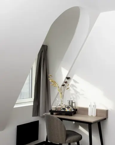 a room with a desk and chair