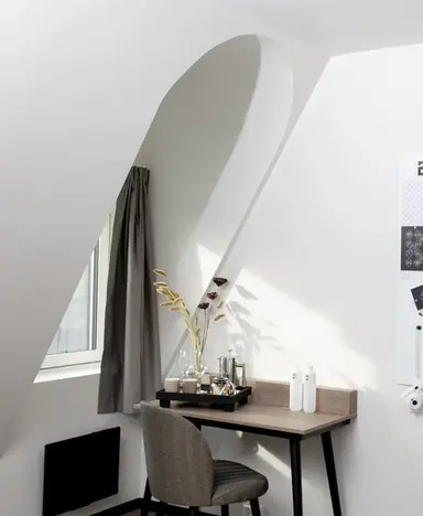 a room with a desk and chair