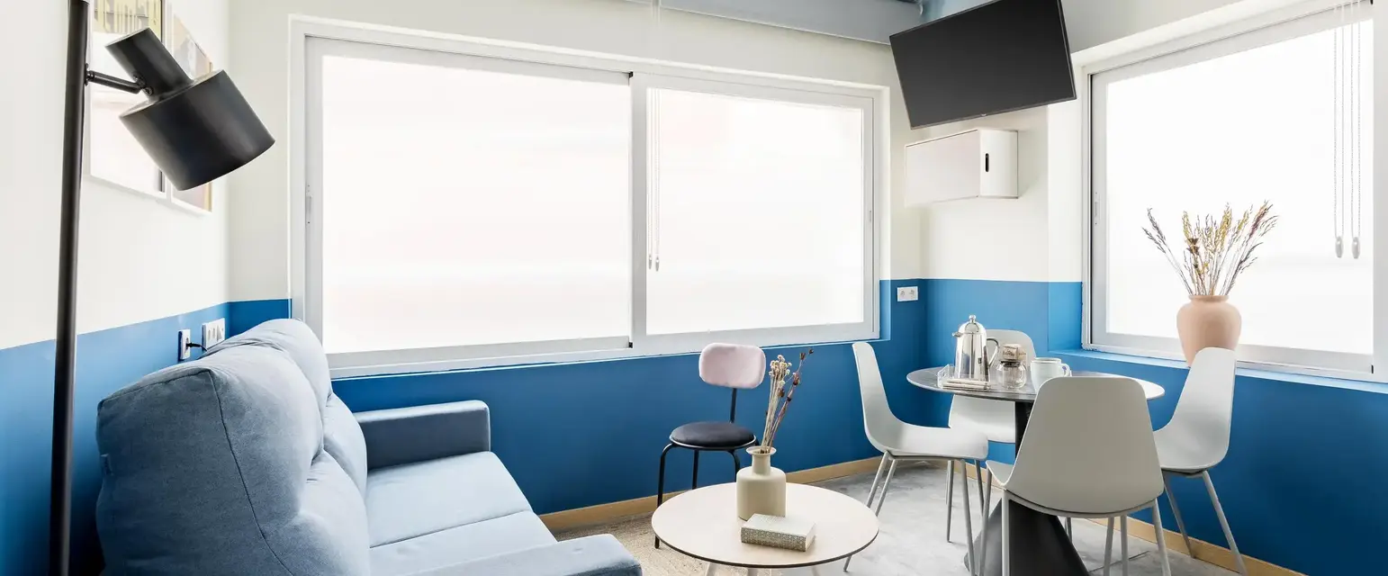 a living room with a couch and table