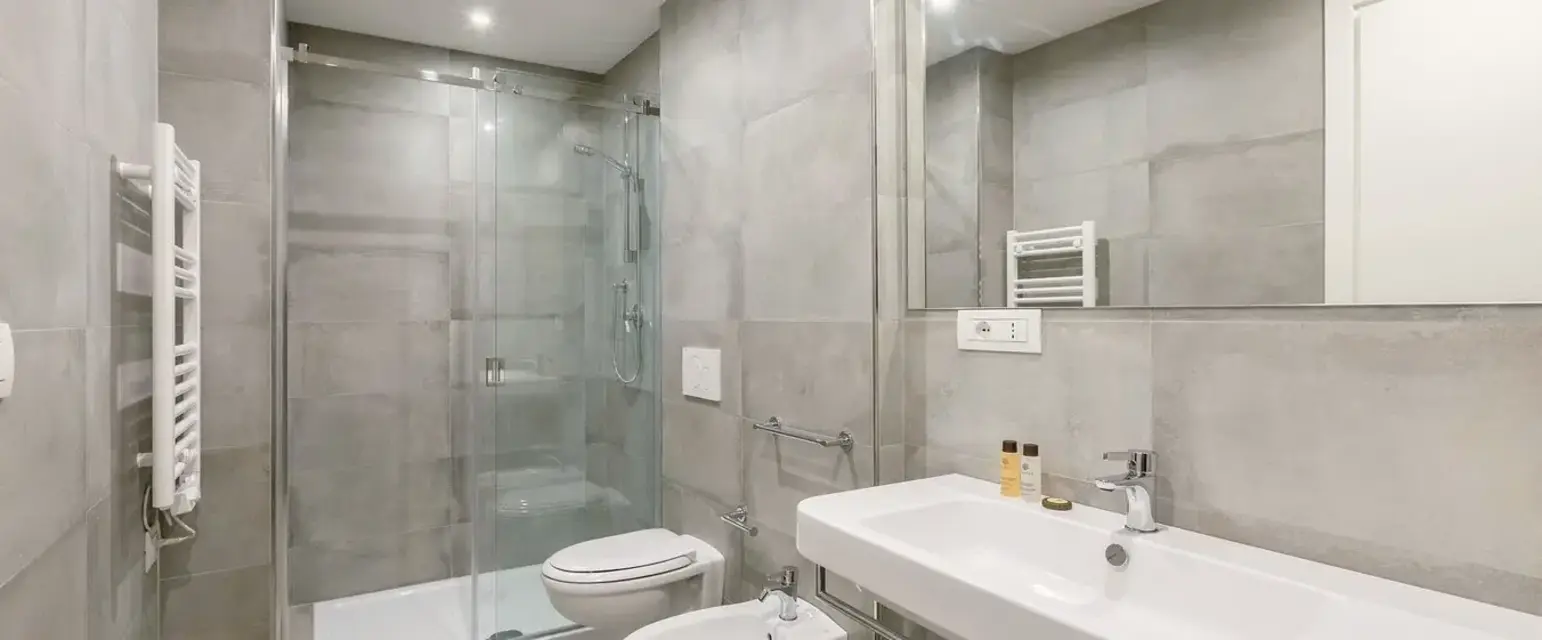 a bathroom with a sink and toilet