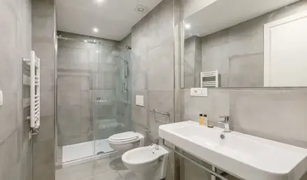 a bathroom with a sink and toilet