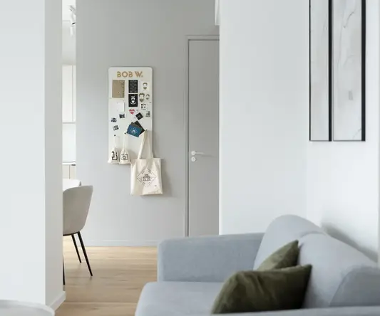 a white door with a white board on it