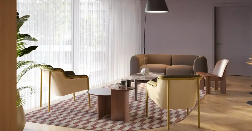 a room with a couch and chairs
