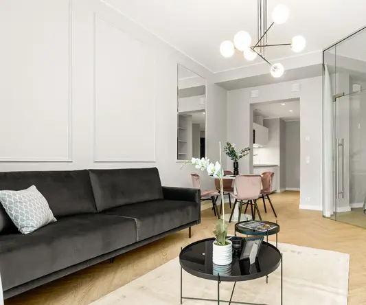 a living room with a couch and a table