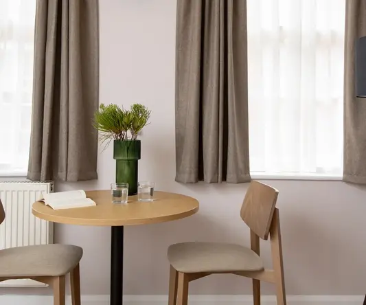 a table and chairs in a room