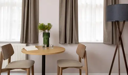a table and chairs in a room