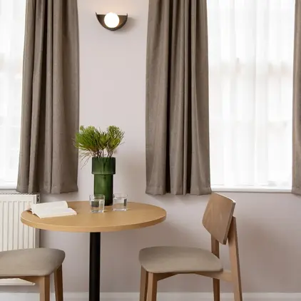 a table and chairs in a room