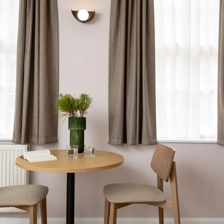 a table and chairs in a room