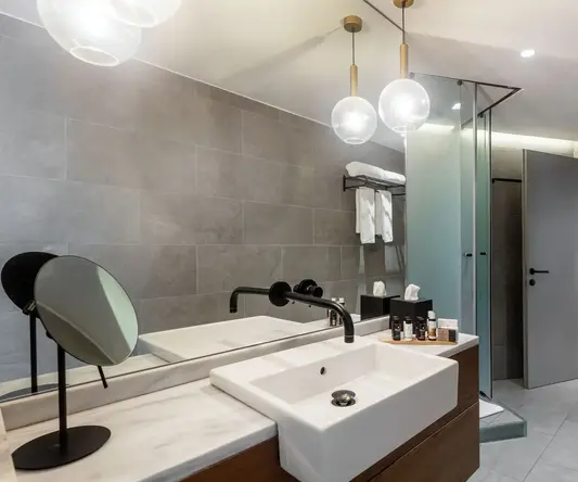 a bathroom with a sink and a shower