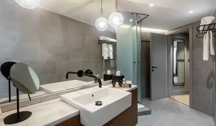 a bathroom with a sink and a shower