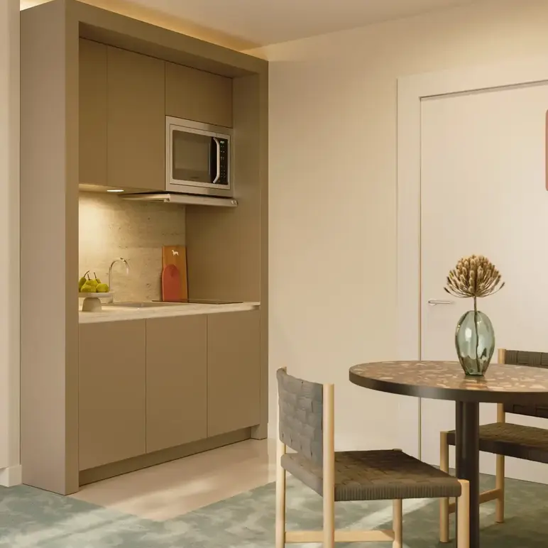 a kitchen with a microwave oven and cabinets