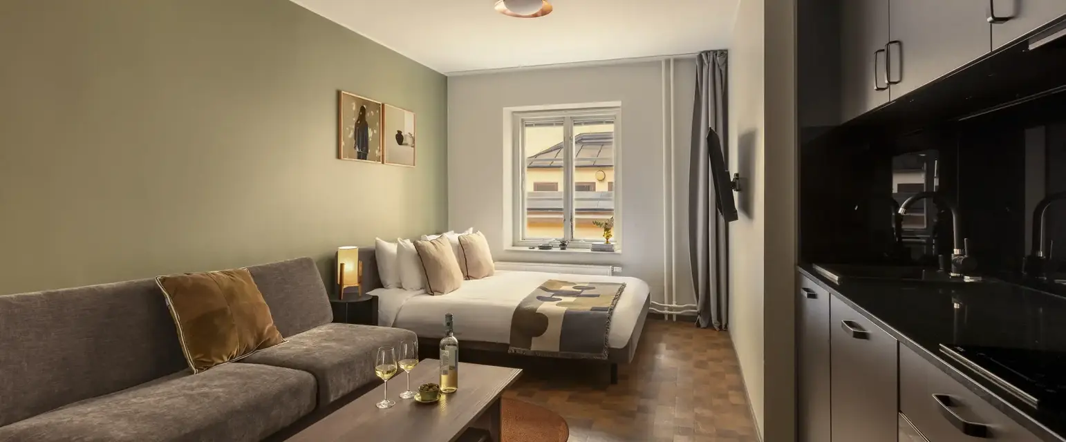 a room with a couch and a bed
