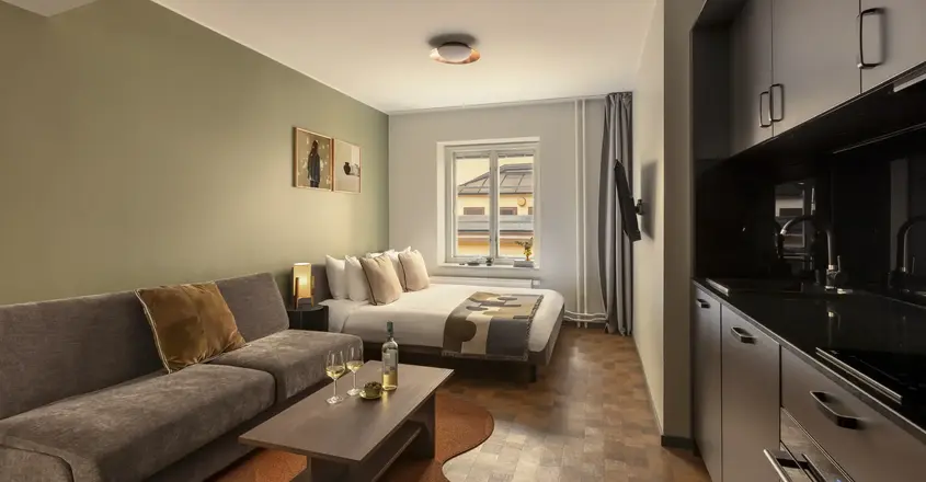 a room with a couch and a bed