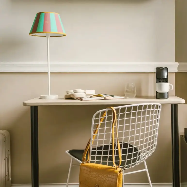 a chair and a lamp in a room