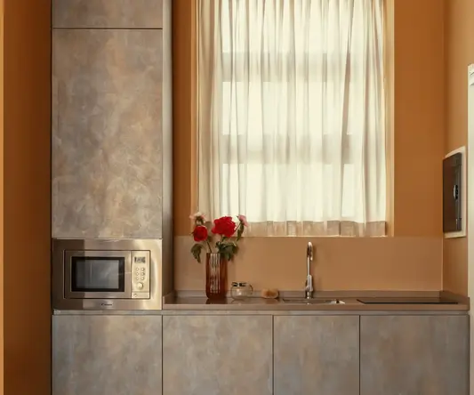 a kitchen with a microwave and a window