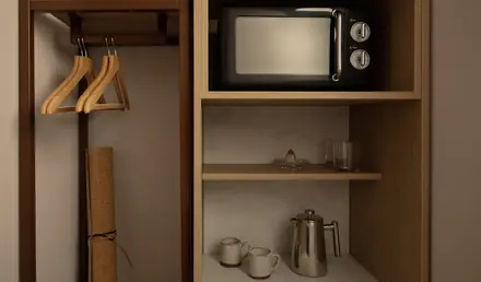 a microwave on a shelf