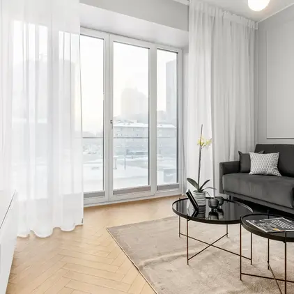 a living room with a couch and coffee table