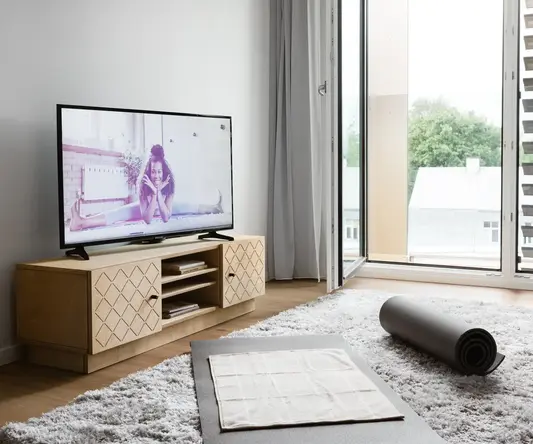 a tv on a stand in a room