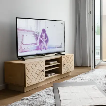 a tv on a stand in a room