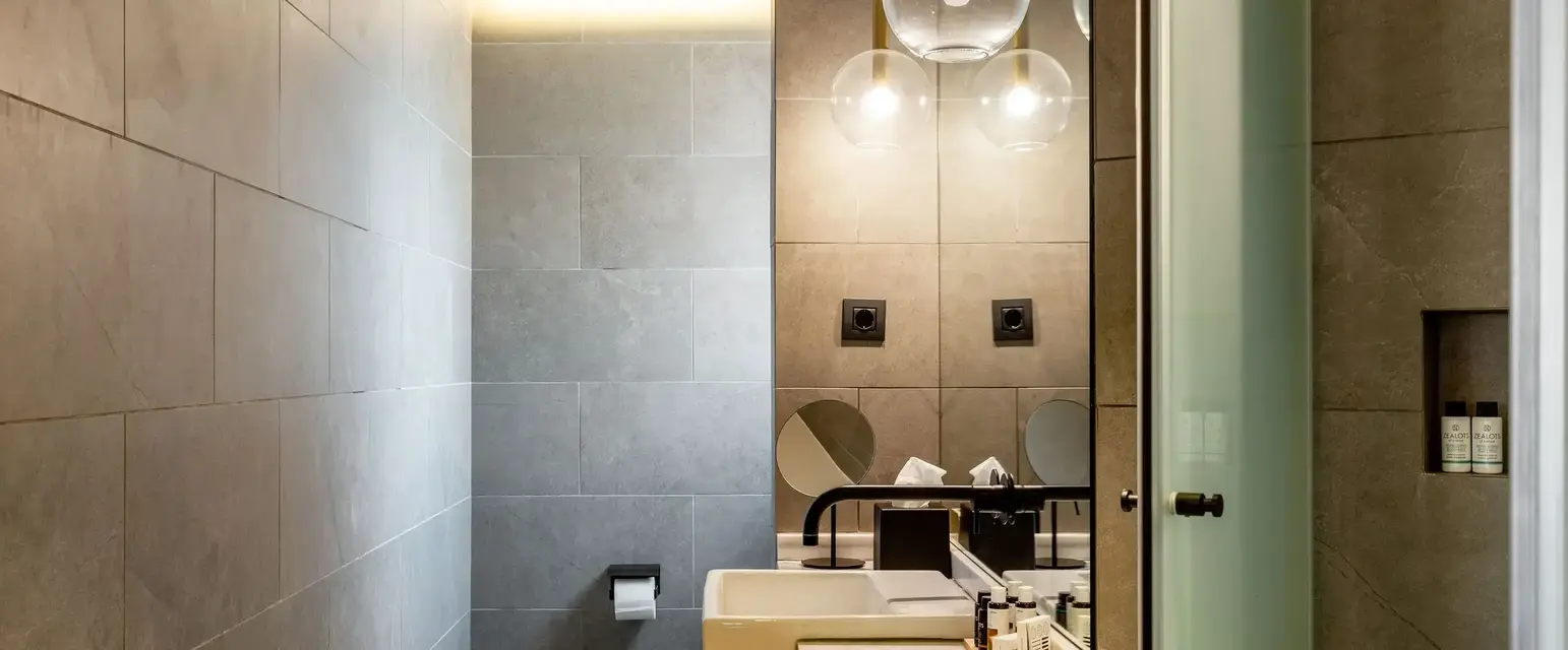 a bathroom with a sink and toilet