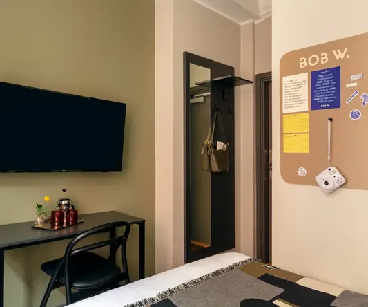 a room with a tv on the wall