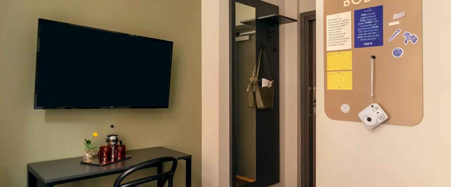 a room with a tv on the wall