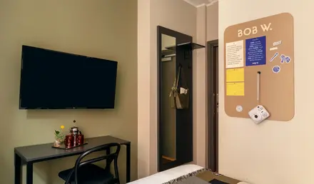 a room with a tv on the wall