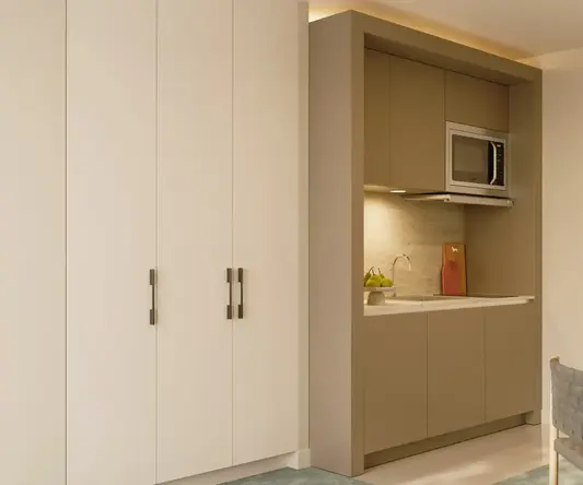 a kitchen with a microwave oven and cabinets