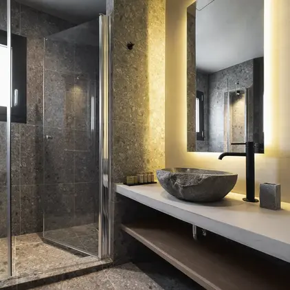 a bathroom with a sink and shower