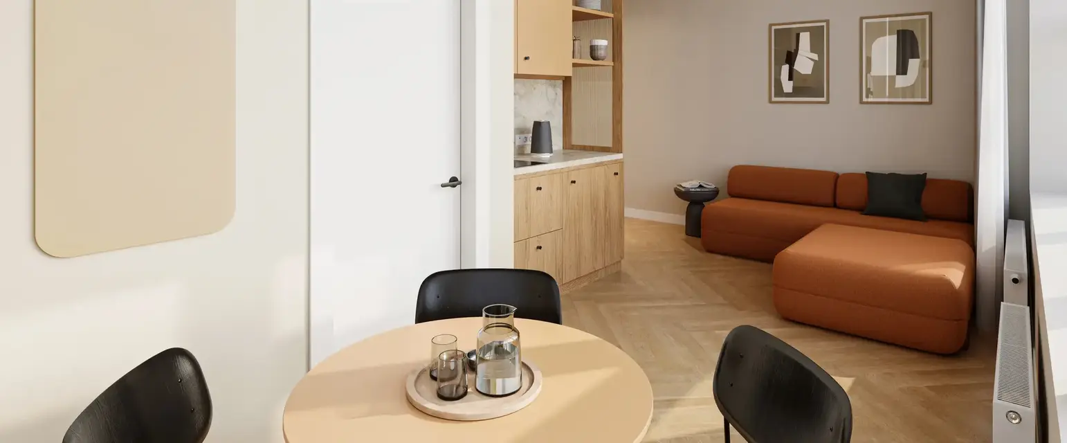 a room with a table and chairs