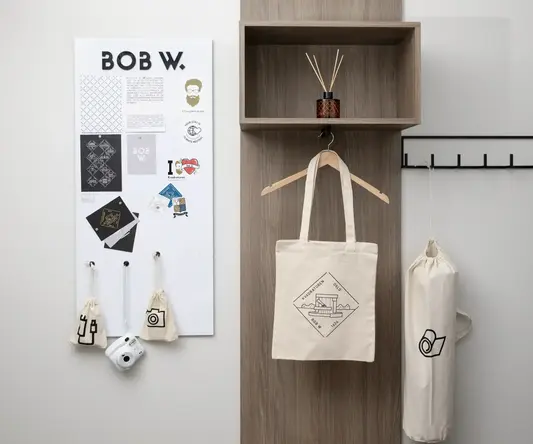 a shelf with bags on it