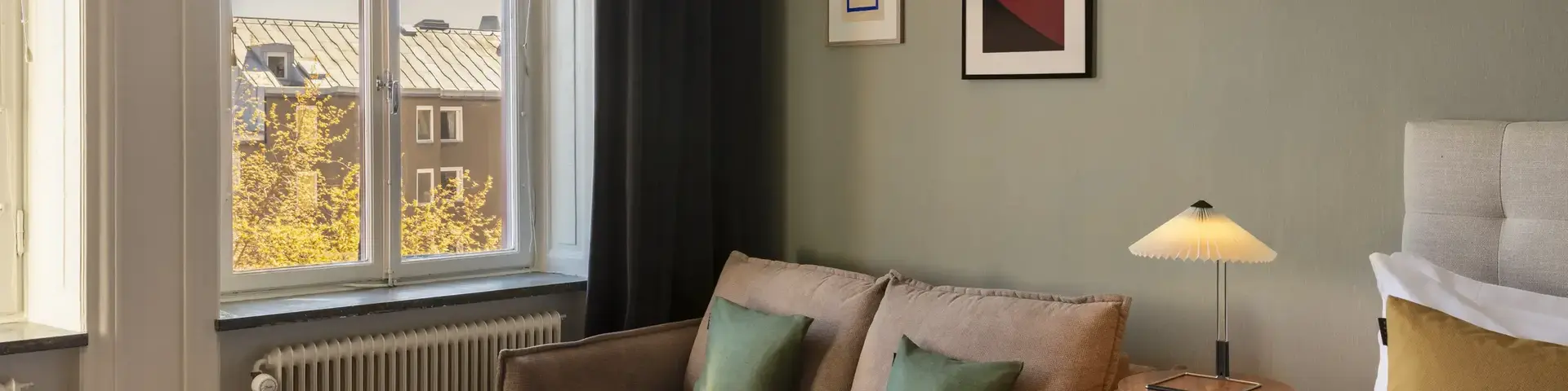 a room with a couch and a bed