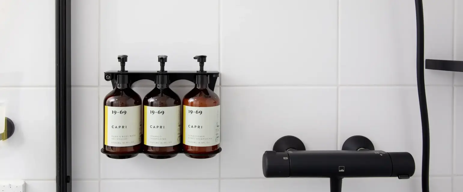 a group of bottles on a wall