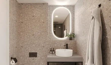 a bathroom with a sink toilet and a mirror