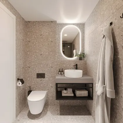 a bathroom with a sink toilet and a mirror