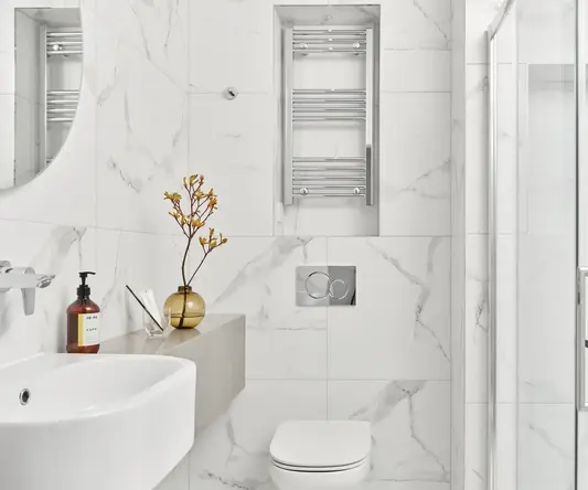 a bathroom with a sink and toilet