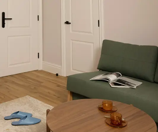 a couch and coffee table in a room