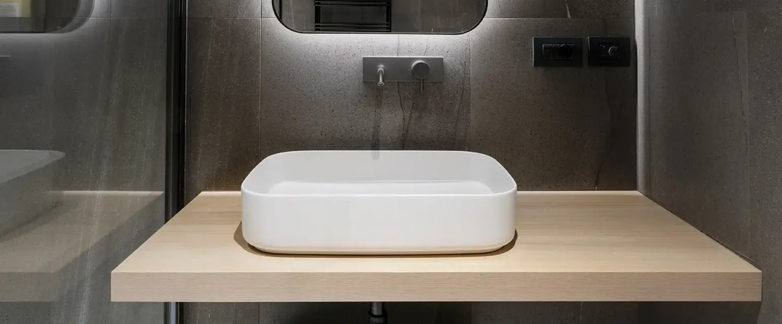 a sink and mirror in a bathroom
