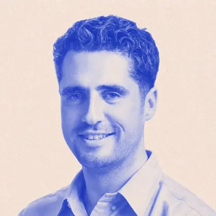 a man smiling for a picture