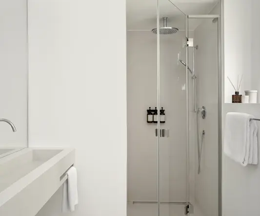 a bathroom with a glass shower