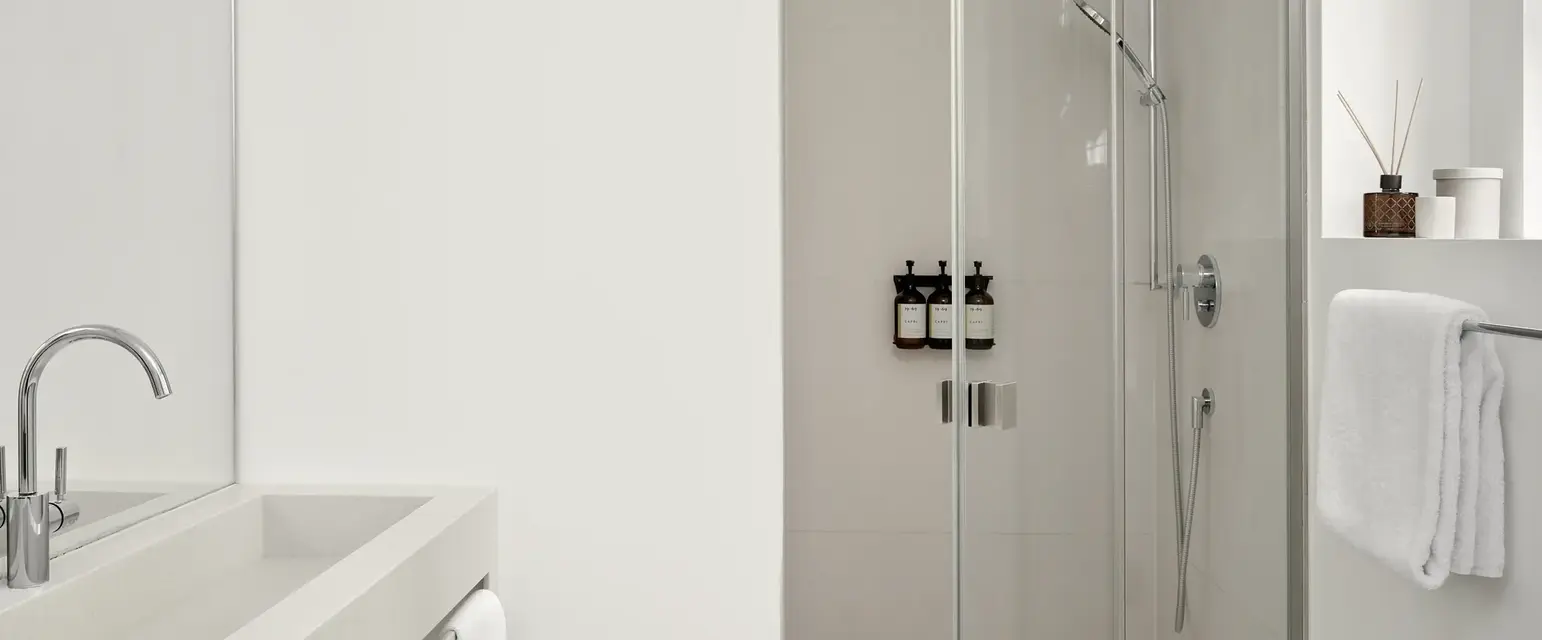 a bathroom with a glass shower