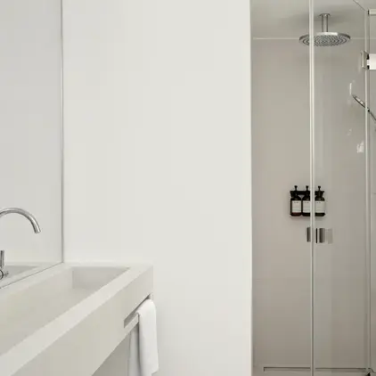 a bathroom with a glass shower