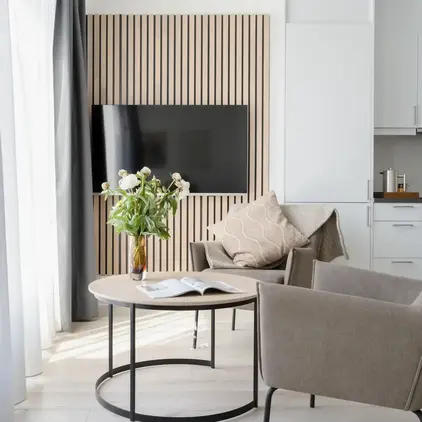 a room with a table and chairs