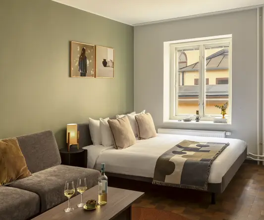 a room with a bed and a couch