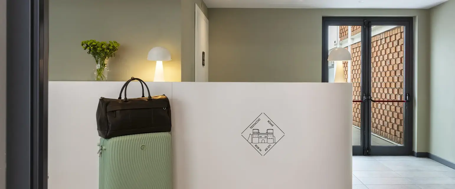 a luggage on a white wall